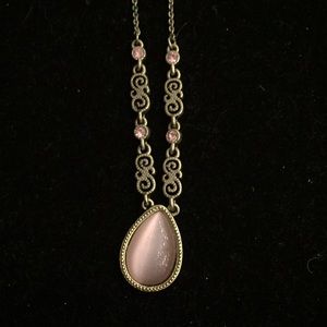 Pink necklace with matching earrings.